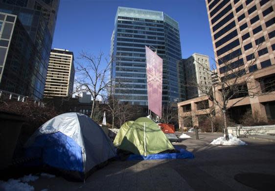 A small Occupy Wall Street camp sits in a public plaza across the street from Goldman Sachs' office building at 222 South Main Street in Salt Lake City, Utah January 11, 2012.