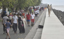 MUMBAI, INDIA - JUNE 7: Huge crowd walks at Marine drive during the first phase of Unlock 1.0, on June 7, 2020 in Mumbai, India. (Photo by Satyabrata Tripathy/Hindustan Times via Getty Images)