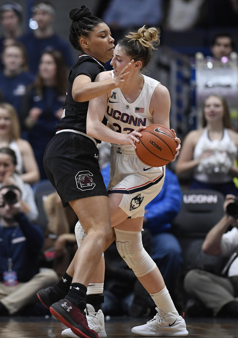 South Carolina's Victaria Saxton, left, pressures Connecticut's Katie Lou Samuelson, right, during the first half of an NCAA college basketball game, Monday, Feb. 11, 2019, in Hartford, Conn. (AP Photo/Jessica Hill)