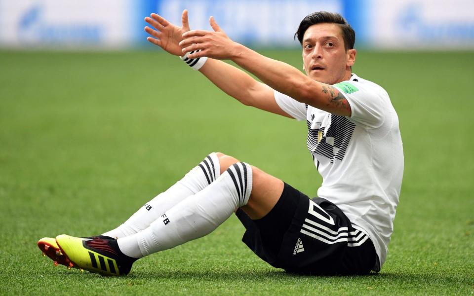 Mesut Ozil could not find a way to unpick the Mexican defence - AFP