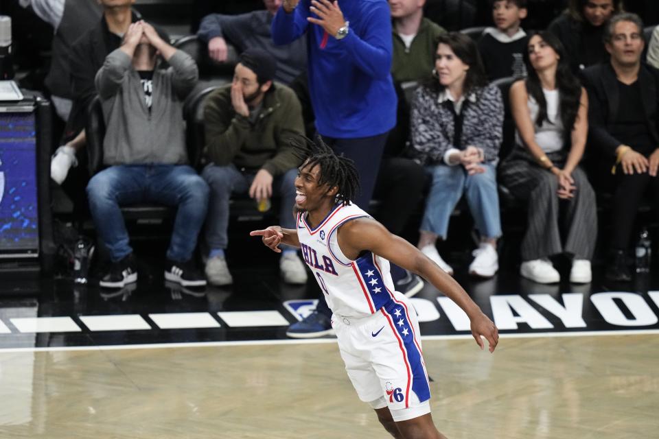 Philadelphia 76ers' Tyrese Maxey (0) celebrates after making a 3-point shot against the Brooklyn Nets during the second half of Game 3 of an NBA basketball first-round playoff series Thursday, April 20, 2023, in New York. The 76ers won 102-97. (AP Photo/Frank Franklin II)