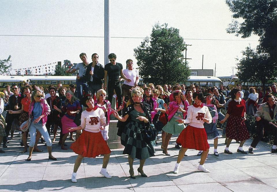 The students sing 'Back to School' in Grease 2