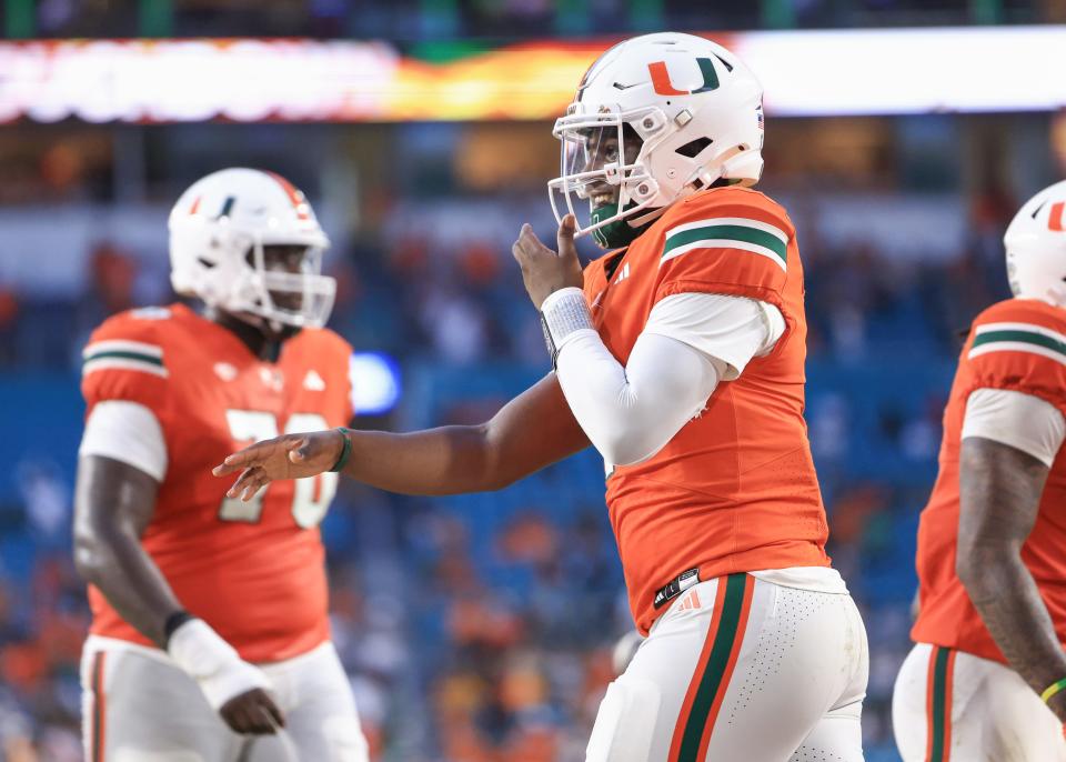 MIAMI GARDENS, FLORIDA - SEPTEMBER 14: Quarterback Cam Ward #1 of the Miami Hurricanes celebrates a touchdown against the Ball State Cardinals during the first half at Hard Rock Stadium on September 14, 2024 in Miami Gardens, Florida. (Photo by Carmen Mandato/Getty Images)