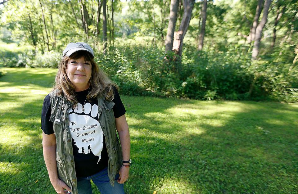 Suzanne Ferencak is shown on her property in Holmes County where she believes there has been Bigfoot activity in recent years. Ferencak  will be among the featured Sasquatch investigators at the Bigfoot Basecamp Weekend on Thursday through Sunday at Pleasant Hill Lake Park in Ashland County.