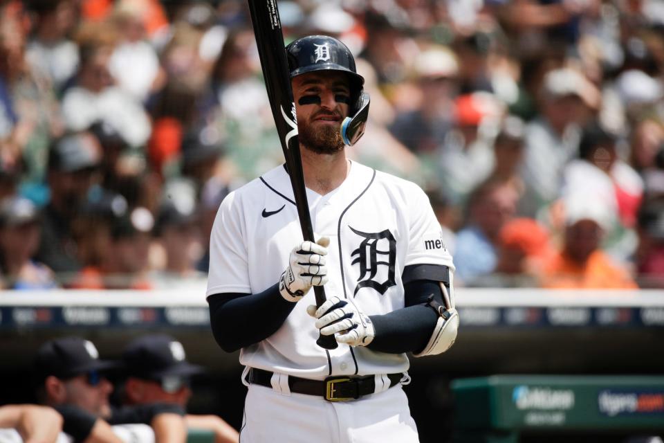 Detroit Tigers catcher Eric Haase warms up during the fourth inning at Comerica Park in Detroit, Michigan on July 23, 2023.