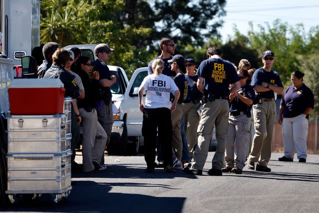 <p>Paul Chinn/The San Francisco Chronicle/Getty</p> A team of FBI investigators prepares to search a home for clues in the 18-year-old kidnapping case of Jaycee Dugard in Antioch, California.