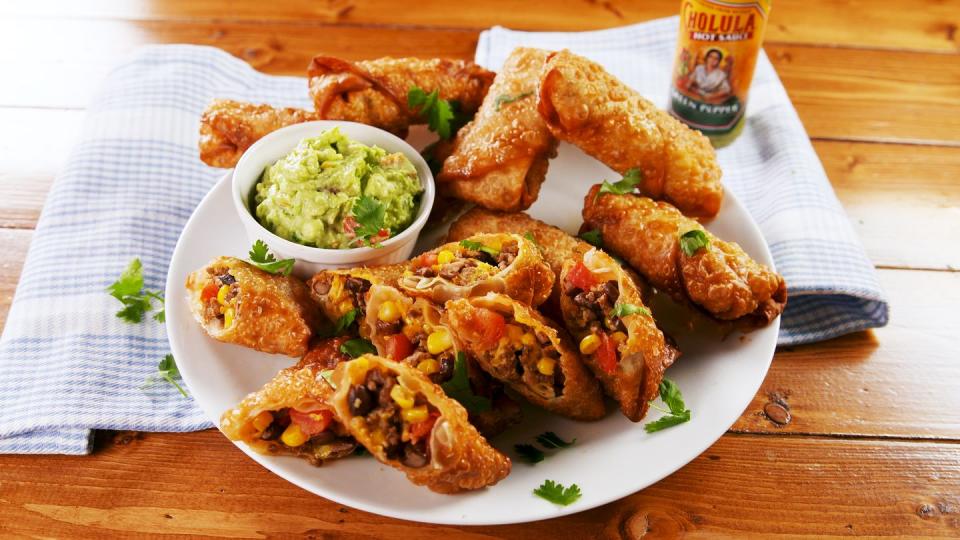 <p>This is the ultimate hybrid.</p><p>Get the recipe from <a href="https://www.delish.com/cooking/recipe-ideas/a25845905/burrito-egg-rolls-recipe/" rel="nofollow noopener" target="_blank" data-ylk="slk:Delish;elm:context_link;itc:0;sec:content-canvas" class="link ">Delish</a>.</p>