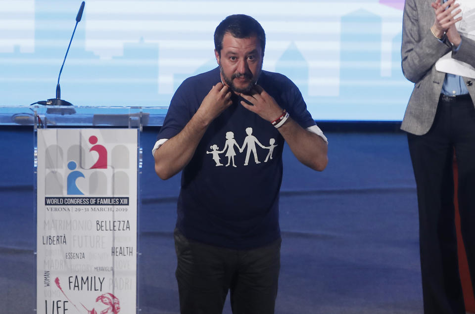 Italian Deputy-Premier Matteo Salvini addresses the audience after delivering his speech at the World Congress of Families, in Verona, Italy, Saturday, March 30, 2019. A congress in Italy under the auspices of a U.S. organization that defines family as strictly centering around a mother and father has made Verona — the city of Romeo and Juliet — the backdrop for a culture clash over family values, with a coalition of civic groups mobilizing against what they see as a counter-reform movement to limit LGBT and women's rights. (AP Photo/Antonio Calanni)