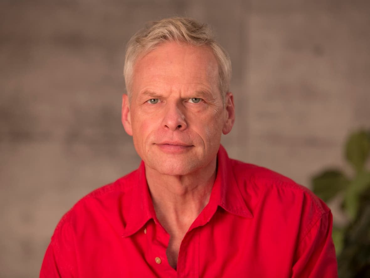 College of Integrated Philosophy leader John de Ruiter was charged in January with four counts of sexual assault. On Tuesday, Edmonton police announced three charges against his wife, Leigh Ann de Ruiter.  (johnderuiter.com - image credit)
