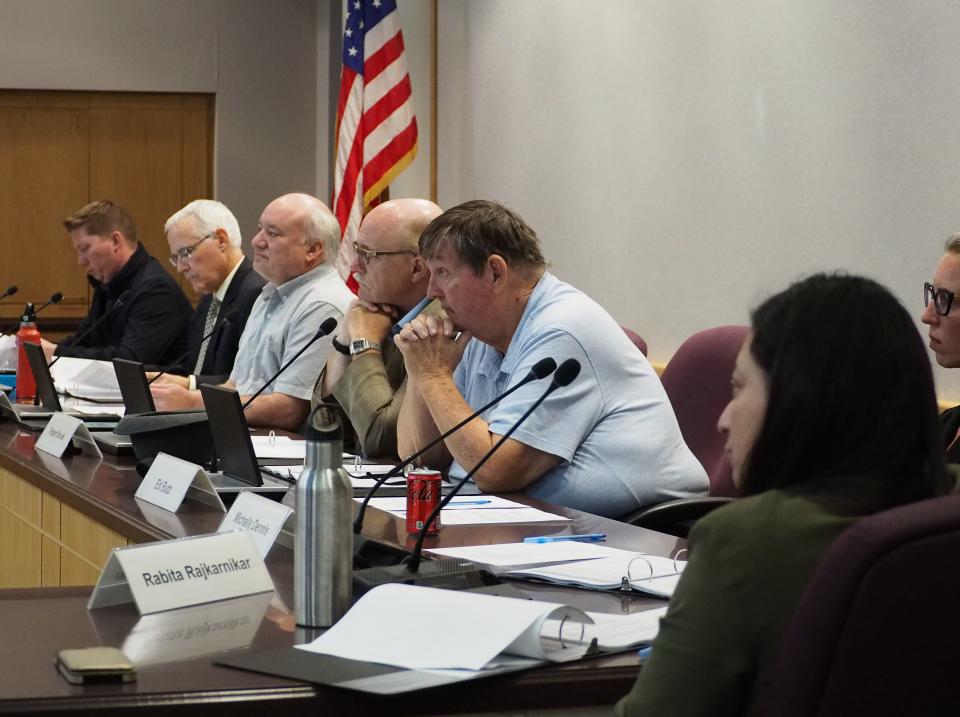 The Tippecanoe County Area Board of Zoning Appeals members listen to concerned neighbors share their displeasure of the board's willingness to approve special exceptions to allow homeowners to turn their properties into Airbnb at the meeting, on Wednesday, Oct. 25, 2023, in Lafayette.