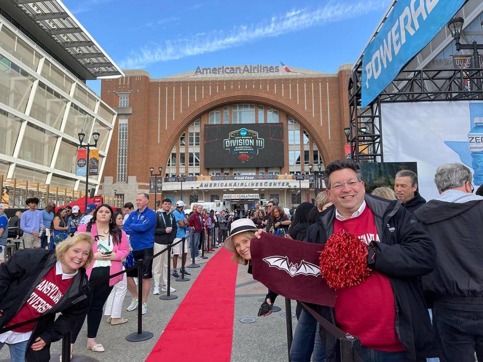 Transylvania women’s basketball fans line the red carpet while waiting for the team to arrive outside the American Airlines Center prior to the NCAA Division III Tournament championship game on Saturday in Dallas.