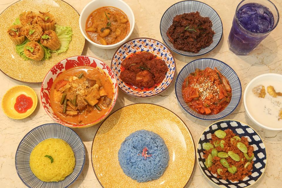 This spread of dishes at Herba and Rempah includes the 'sambal petai hae bee' at the bottom right, which is scarcely seen in KL anymore.