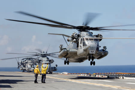 A Marine Corps CH-53 Super Stallion lifts off from the USS Kearsarge as U.S. military personnel continue to evacuate the U.S. Virgin Islands in advance of Hurricane Maria, in the Caribbean Sea near the islands September 18, 2017. REUTERS/Jonathan Drake