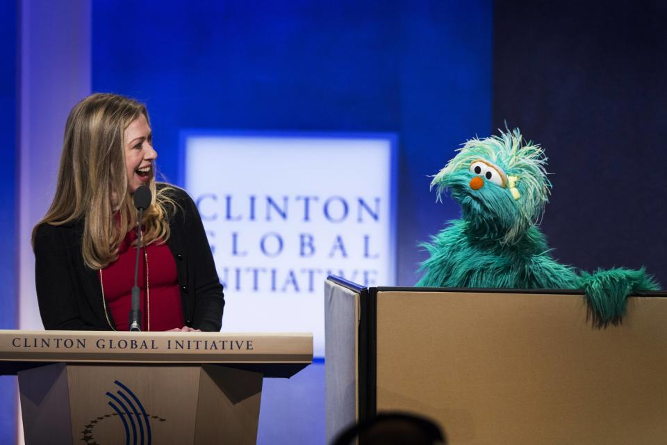 Chelsea, daughter of former U.S. President Clinton, speaks to Rosita the muppet during the CGI in New York