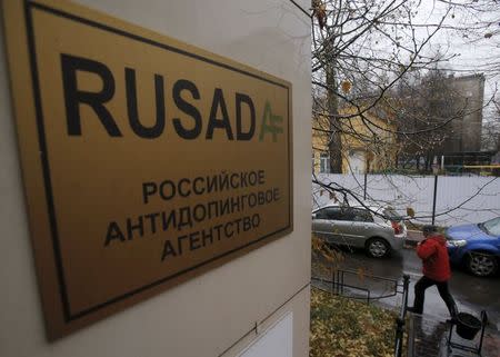 A man walks outside an office of the Russian Anti-Doping Agency (RUSADA) in Moscow, Russia, November 10, 2015. REUTERS/Maxim Shemetov