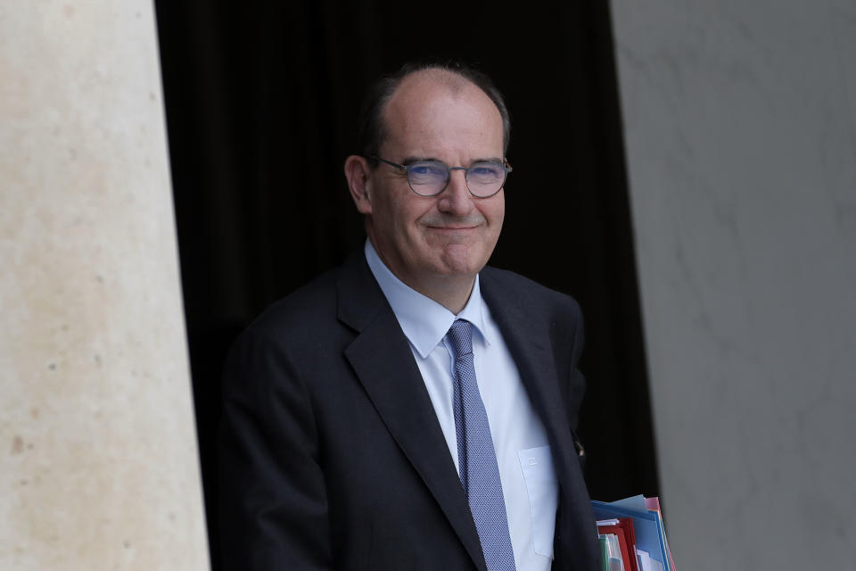 France's Prime Minister Jean Castex leaves after the weekly cabinet meeting at the Elysee Palace in Paris, Wednesday, July 15, 2020. (AP Photo/Christophe Ena)