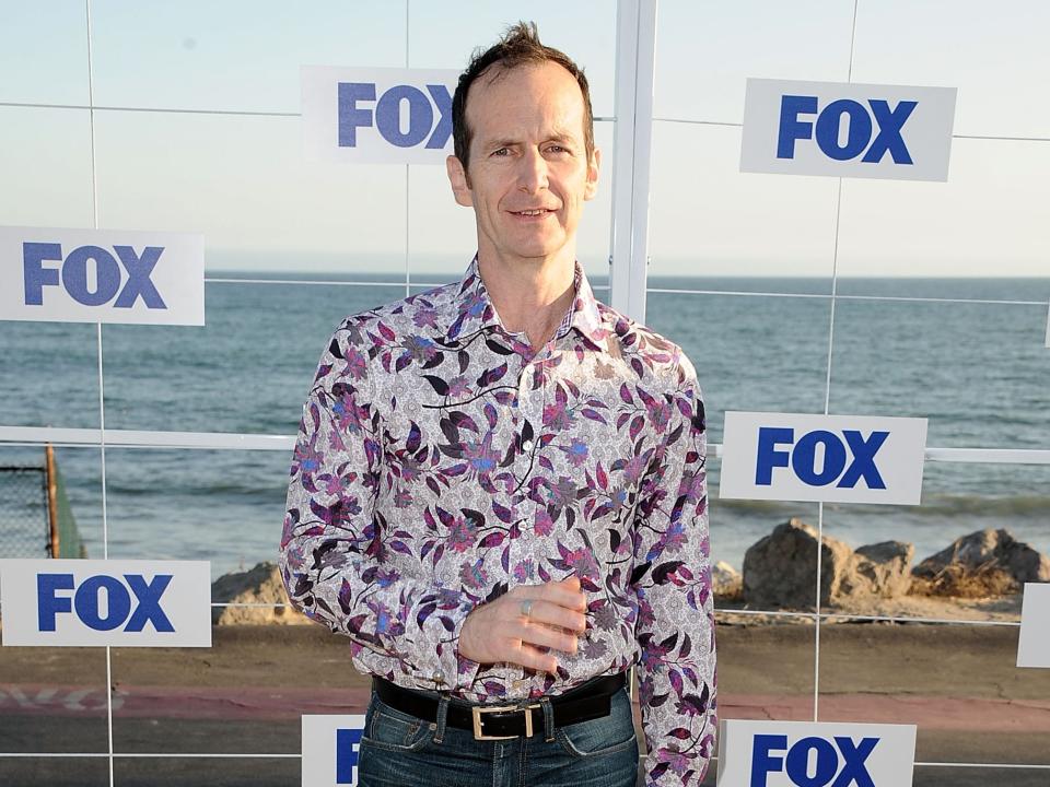 Denis O'Hare in 2011 wearing a flower button down