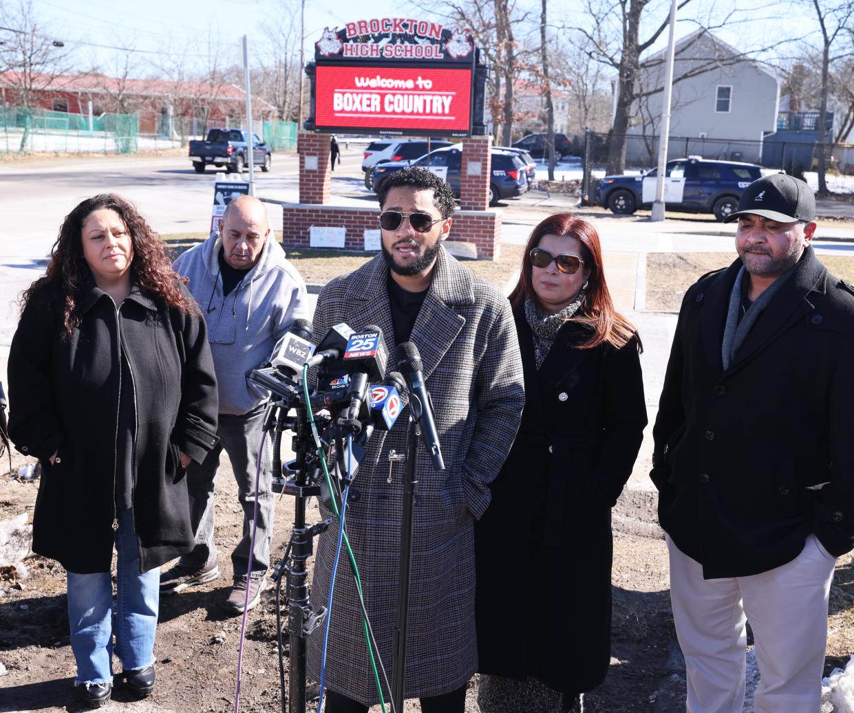 Brockton School Committee members, from left, Joyce Asack, Claudio Gomes, Ana Oliver and Tony Rodrigues, hold a press conference at Brockton High School on Monday, Feb. 19, 2024, regarding their request that the National Guard be deployed at the school amid reports of high levels of violence and turmoil.