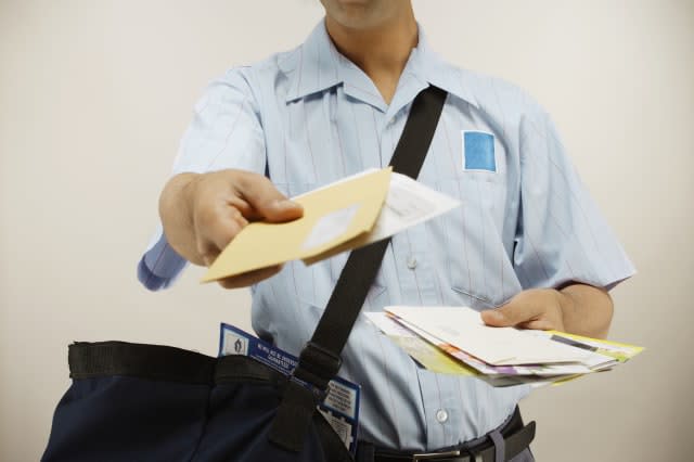 Postman delivering mail