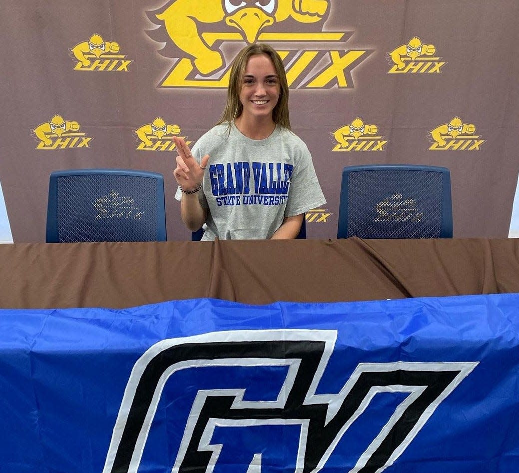 Zeeland East's Sadie Huizenga signed with Grand Valley State on Wednesday.