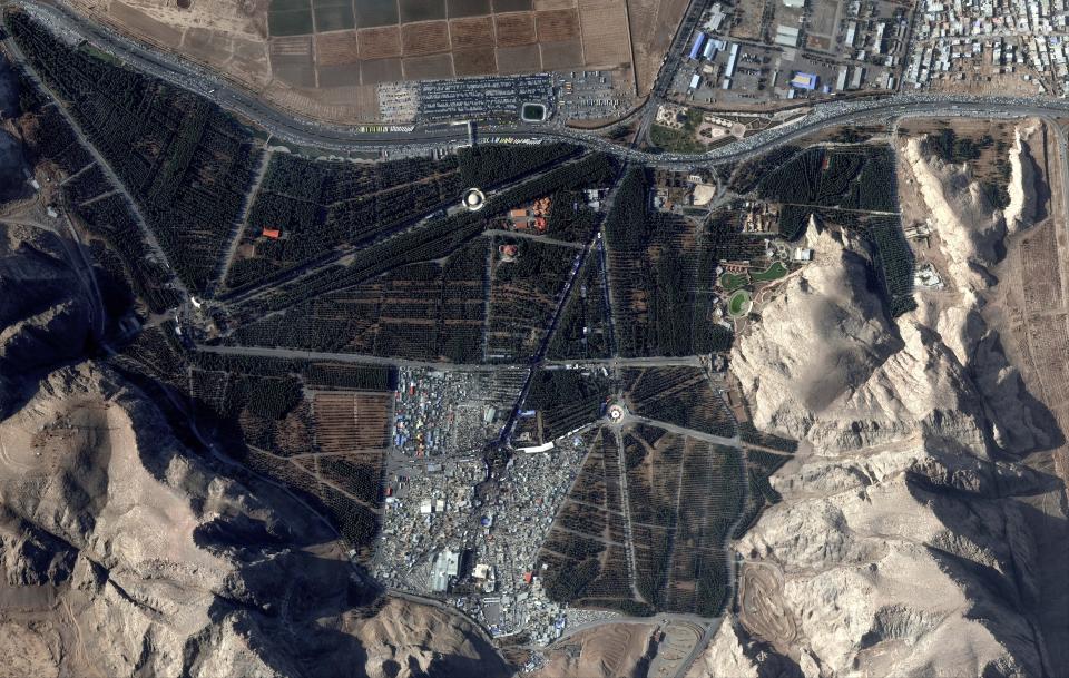 This image, provided by Maxar Technologies, shows an overview of the martyr's cemetery in Kerman, Iran, Wednesday, Jan. 3, 2024 before, according to Iranian authorities, twin bomb blasts killed at least 103 people at an event honoring a prominent Iranian general slain in a U.S. airstrike in 2020. (Satellite image ©2023 Maxar Technologies via AP)