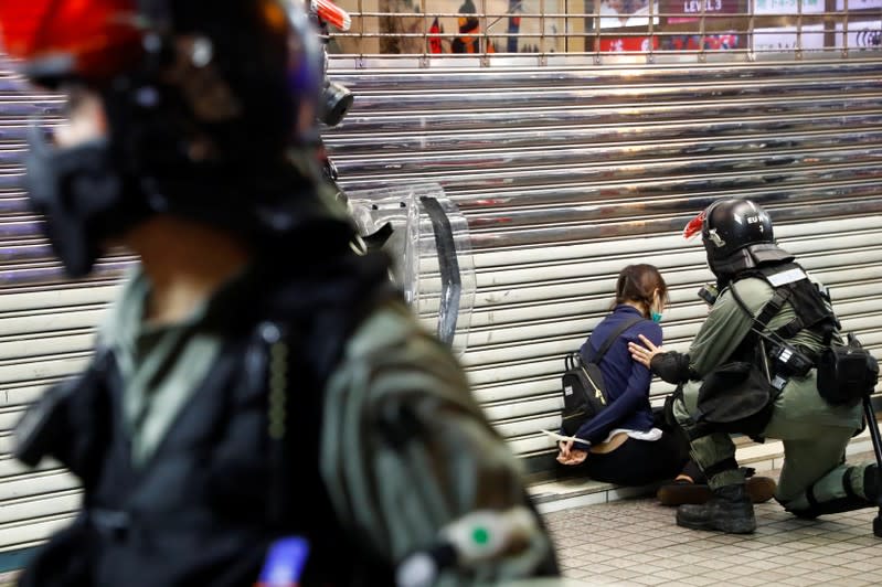 Hong Kong police fire tear gas in feverish start to 22nd weekend of protests in Hong Kong