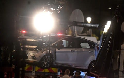 Police recover the car driven by a 29-year-old man, who is a UK national, who was arrested on suspicion of preparing an act of terror  - Credit: Victoria Jones /PA