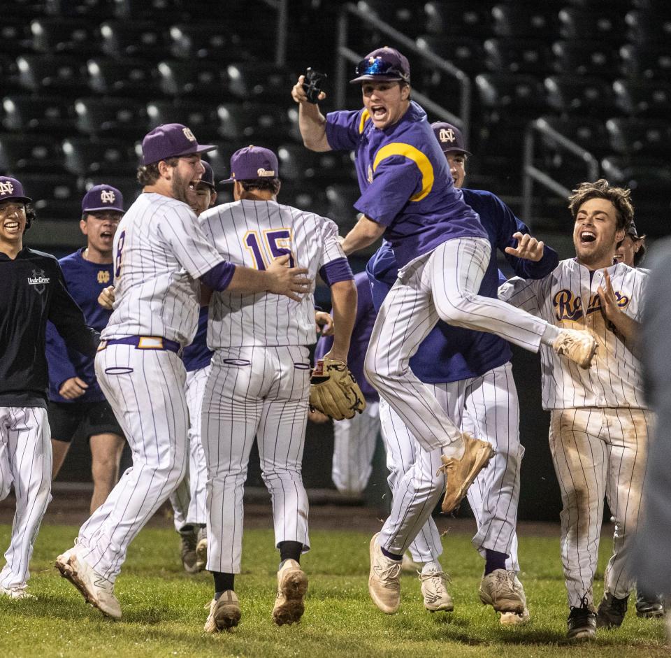 Clarkstown North celebrates after defeating Clarkstown South 3-1 in the annual Supervisor's Cup varsity baseball game at Clover Stadium in Pomona April 28, 2024.