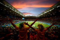 <p>Brazil and Switzerland fans enjoy the opening game from their group </p>