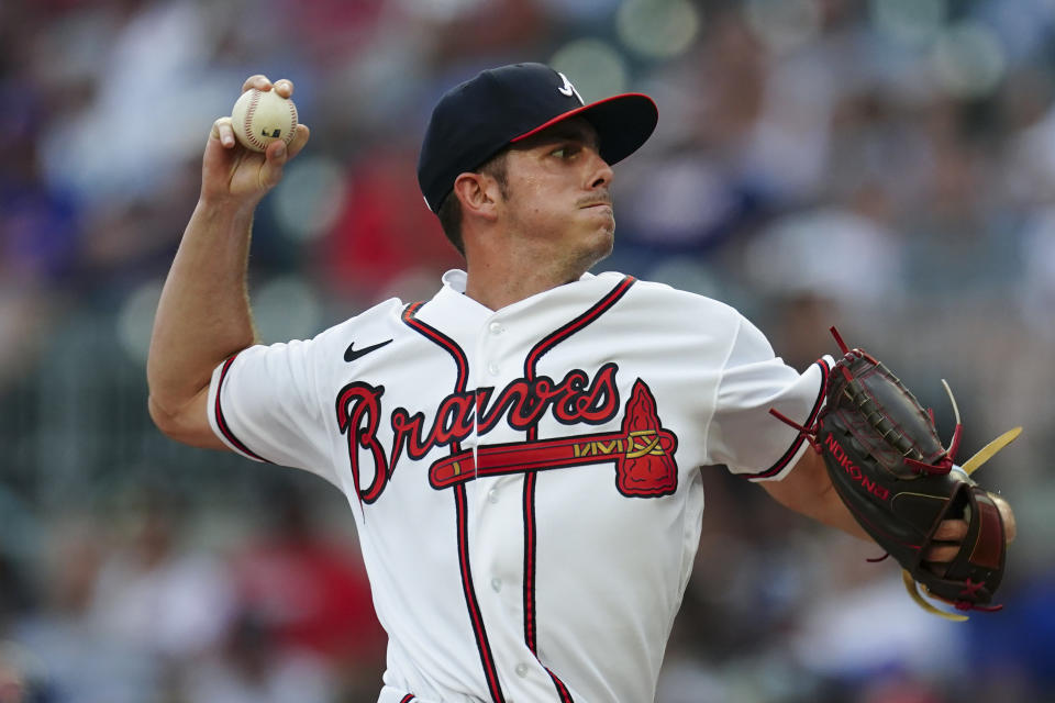 Atlanta Braves pitcher Allan Winans works against the New York Mets in the first inning of a baseball game Monday, Aug. 21, 2023, in Atlanta. (AP Photo/John Bazemore)