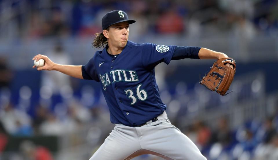 Seattle Mariners starting pitcher Logan Gilbert delivers against the Miami Marlins in the first inning Sunday at loanDepot park. The Mariners would win 7-3.