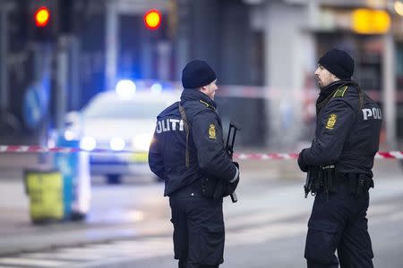 Policemen stand guard near Noerrebro station in Copenhagen February 15, 2015. REUTERS/Claus Bech /Scanpix