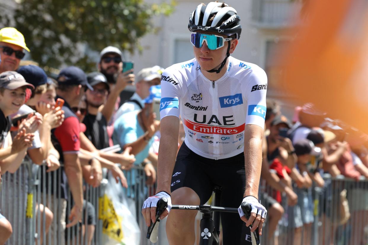 Tadej Pogacar rides to the start of stage 13 (AFP via Getty Images)