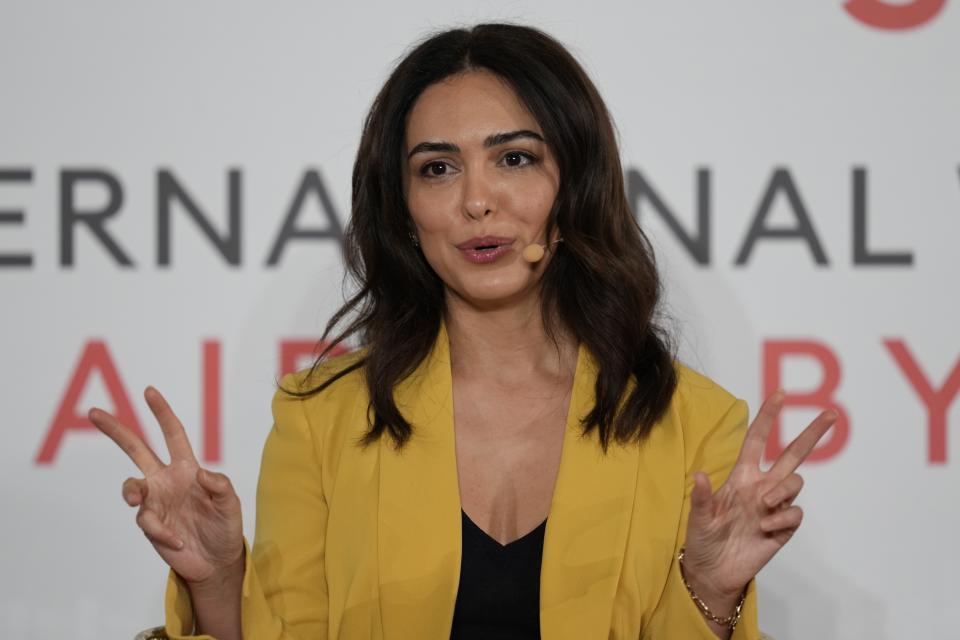 Actor Nazanin Boniadi talks during the International Women's Day in Abu Dhabi, United Arab Emirates, Wednesday, March 8, 2023. Boniadi is urging the world to back the protests in her native Iran calling for women's rights and political change, saying despots fear nothing "more than a free and politically active woman." (AP Photo/Kamran Jebreili)