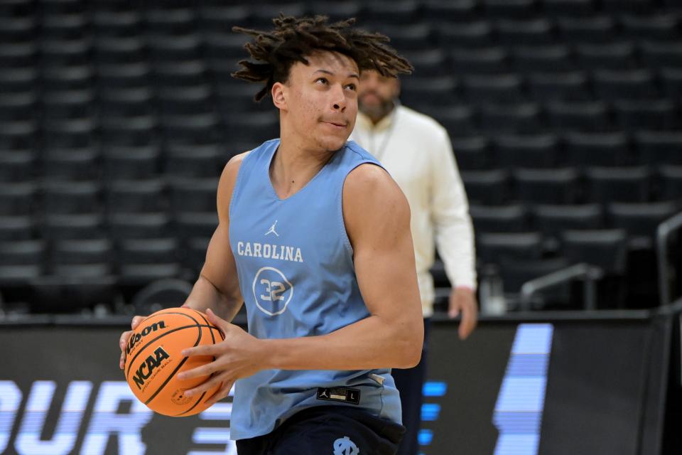 Mar 27, 2024; Los Angeles, CA, USA; North Carolina Tar Heels forward James Okonkwo (32) handles the ball during practice for their Sweet Sixteen college basketball game in the NCAA tournament at Crypto.com Arena. Mandatory Credit: Jayne Kamin-Oncea-USA TODAY Sports