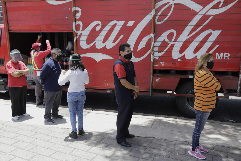 People await tests for possible detection of possible COVID-19 in Lomas de San Lorenzo, Iztpalapa, on July 15, 2020, one of the colonies in Mexico City that returned to a lockdown due to the high number of coronavirus infections in the capital. (Photo by Gerardo Vieyra/NurPhoto via Getty Images)