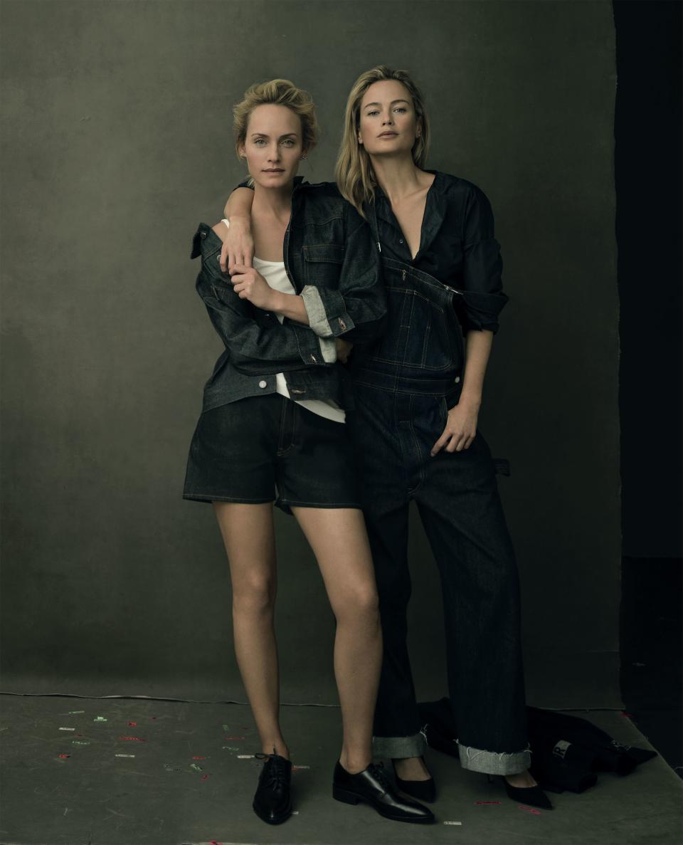 <em>“Photographers and editors learned not to tell me if we were trying for a cover—I’d get nervous and anxious and start tensing up.” —Carolyn Murphy.</em> Amber Valletta (left) wears an A.P.C. jacket, $270; A.P.C., NYC. Vince tank top, $65; vince.com. Acne Studios Blå Konst shorts, $190; Acne Studios, NYC. Dries Van Noten shoes. Murphy (right) wears Dior overalls ($1,750), blouse ($1,450), and shoes; select Dior boutiques.