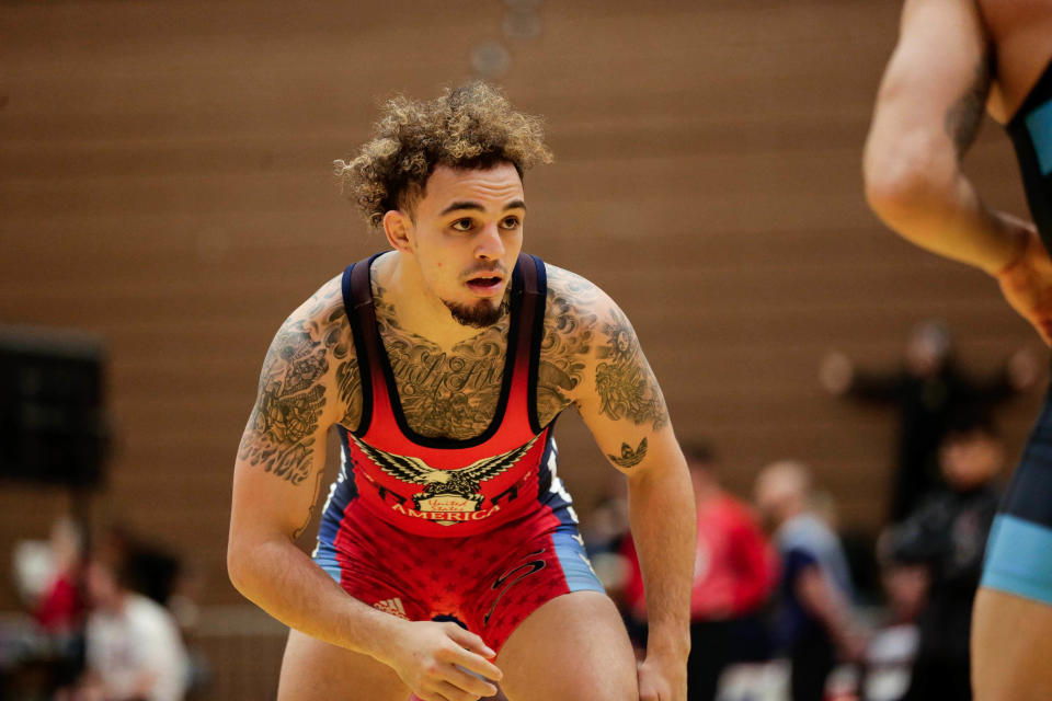 Feb 2, 2017; Colorado Springs, CO, USA; Jordan Oliver (red) competes against Michael Depalma (not pictured) in the FloWrestling Dave Schultz Memorial International at the United States Olympic Training Center. Mandatory Credit: Isaiah J. Downing-USA TODAY Sports