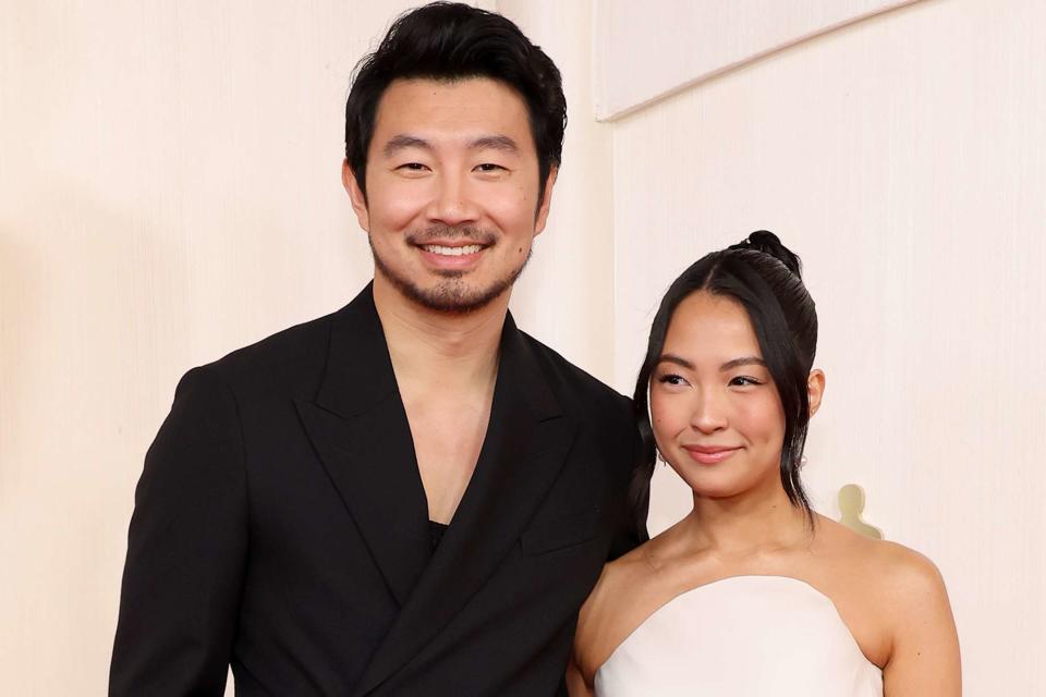 <p>Mike Coppola/Getty</p> Simu Liu and Allison Hsu attend the 96th Annual Academy Awards