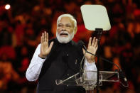 Indian Prime Minister Narendra Modi gestures as he delivers his speech during an Indian community event at Qudos Bank Arena in Sydney, Australia, Tuesday, May 23, 2023. Modi has arrived in Sydney for his second Australian visit as India's prime minister and told local media he wants closer bilateral defense and security ties as China's influence in the Indo-Pacific region grows. (AP Photo/Mark Baker)