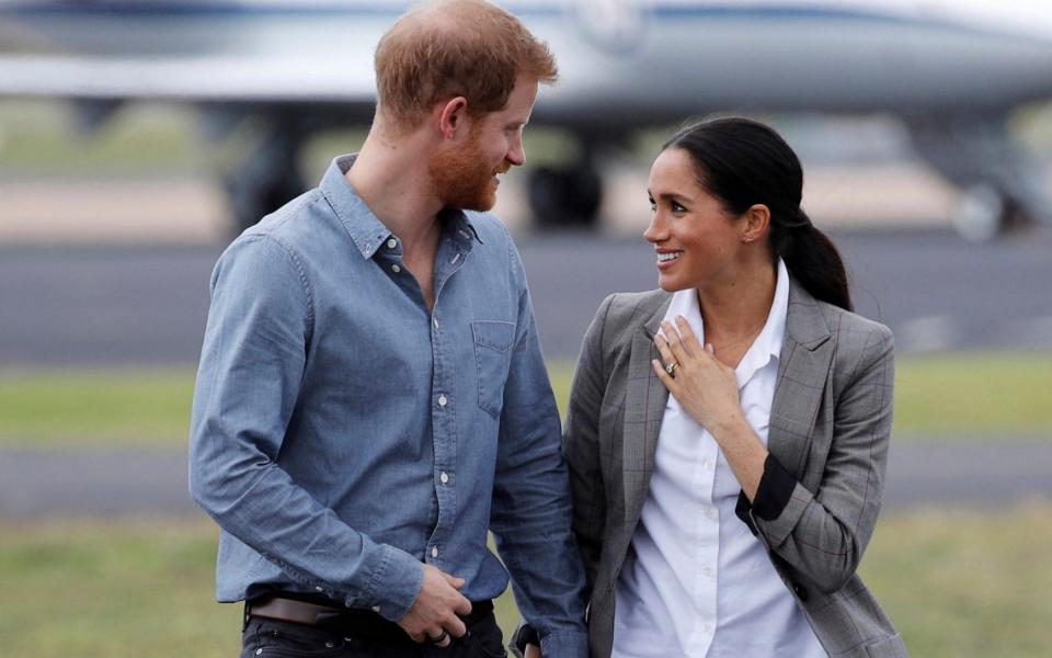 Prince Harry and Meghan, Duchess of Sussex on tour in Australia in 2018 - Reuters