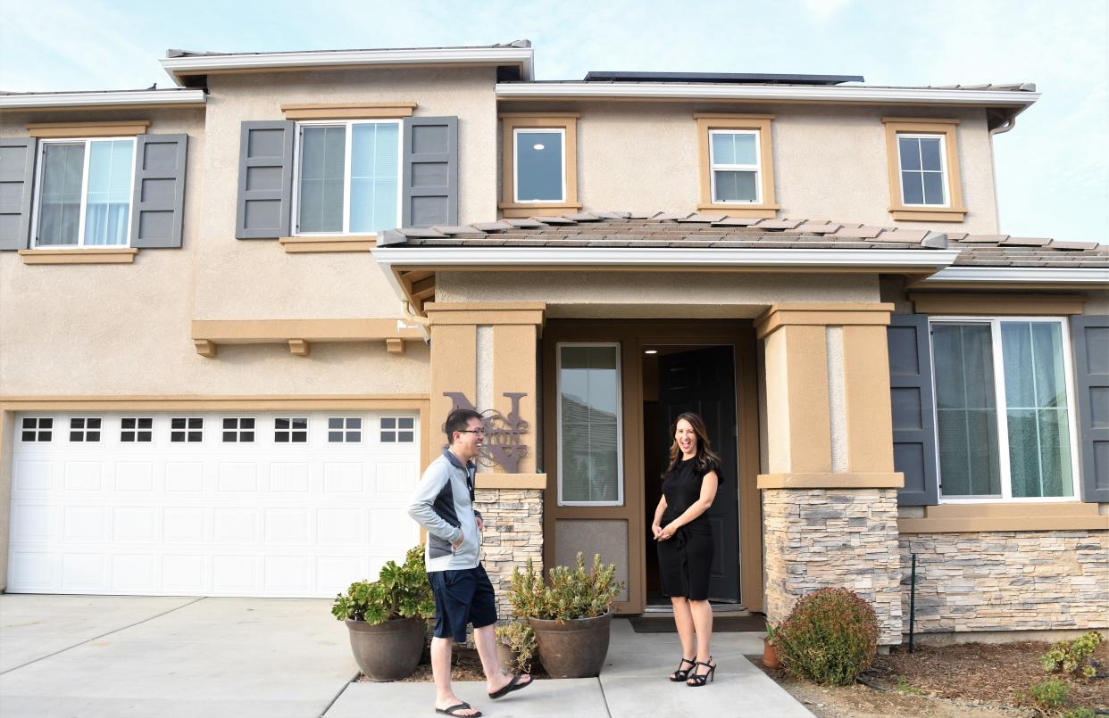 Visalia realtor Karol Anderson meets prospective homebuyer Michael Chenung in the up-and-coming Oak Grove neighborhood.