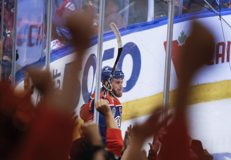 Edmonton Oilers' Connor McDavid (97) celebrates his goal against the Florida Panthers during the second period of Game 4 of the NHL hockey Stanley Cup Final, Saturday, June 15, 2024, in Edmonton, Alberta. (Jeff McIntosh/The Canadian Press via AP)