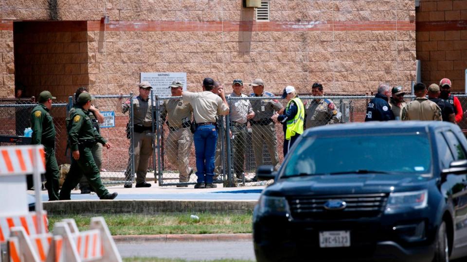 PHOTO: Law enforcement, and other first responders, gather outside Robb Elementary School following a shooting, May 24, 2022, in Uvalde, Texas. (Dario Lopez-mills/AP)