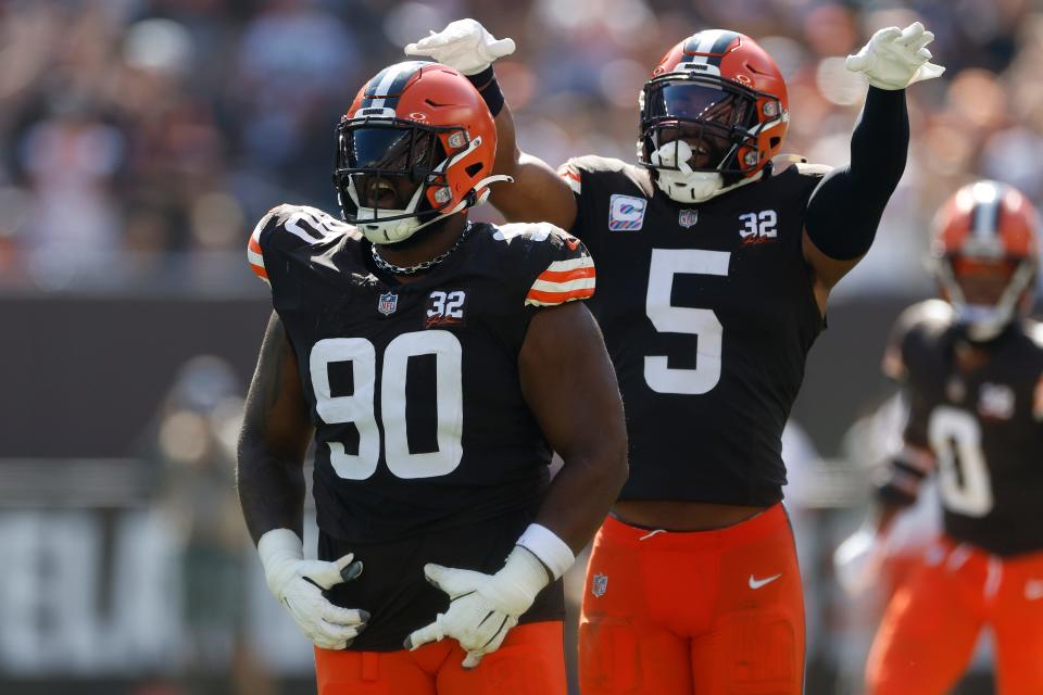 Browns defensive tackle Maurice Hurst II (90) celebrates after recovering a first-half fumble against the Baltimore Ravens on Oct. 1, 2023, in Cleveland.