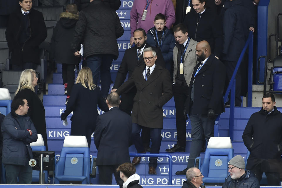 BBC's Match of the Day presenter Gary Lineker, center, arrives to King Power stadium prior to the English Premier League soccer match between Leicester City and Chelsea in Leicester, England, Saturday, March 11, 2023. (AP Photo/Rui Vieira)