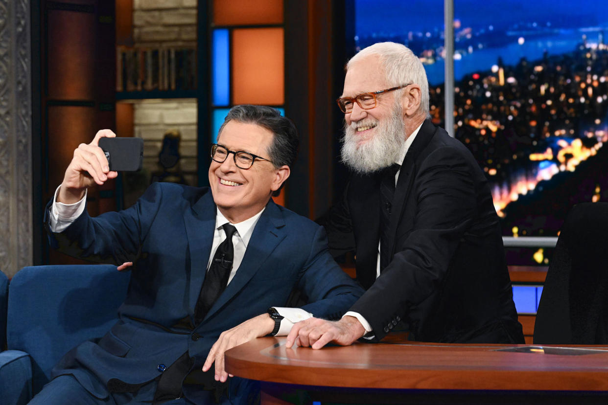 Stephen Colbert and guest David Letterman take a selfie. (Scott Kowalchyk / CBS)