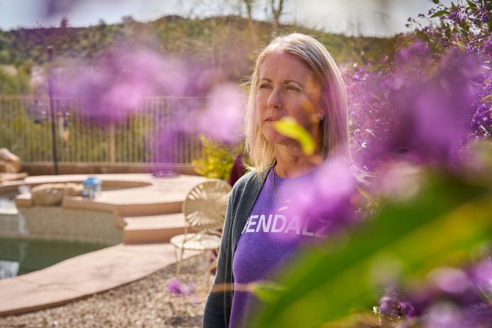 Tina Rodrigues poses for a portrait in the backyard of her Goodyear home on March 6, 2023.