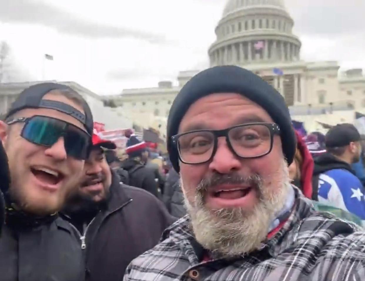Joe Biggs celebrates following the Jan. 6, 2021, riot at the U.S. Capitol, where Congress was voting to certify the 2020 election.
