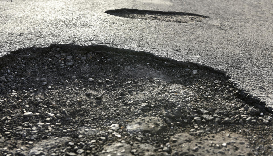 Councils have tight budgets to fix potholes. (Getty Images)